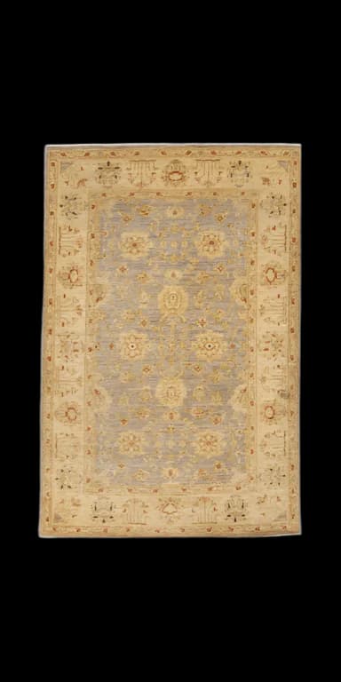 Before: Oushak wool area rug before and after deep cleaning